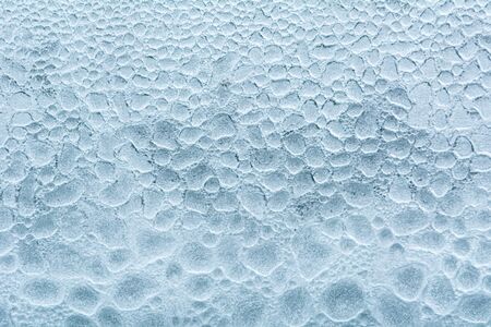 Water droplets on the glass . Drops of water.