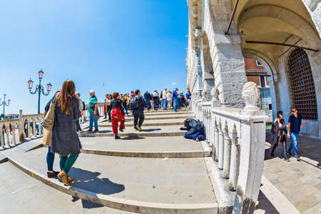 Venice, Italy - MAY 16, 2019: Tourists walk along the Straw bridgePonte della Paglia in Veniceのeditorial素材