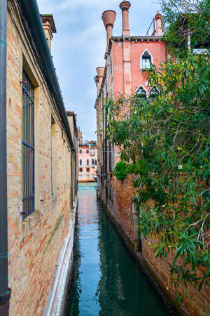 Venice, Italy - OCT 01, 2018: The picturesque narrow canal and the ancient architecture of Veniceのeditorial素材