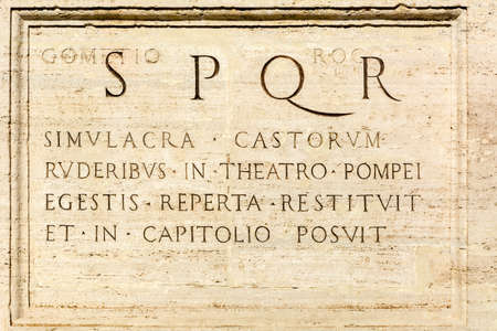 Rome, Italy - Oct 03, 2018: Commemorative inscription on the pedestal of the statue, Capitoline Square, Romeのeditorial素材