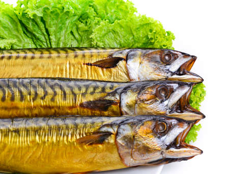 Appetizing smoked fish on a platter with white background