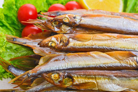 Dried smoked capelin on a plate
