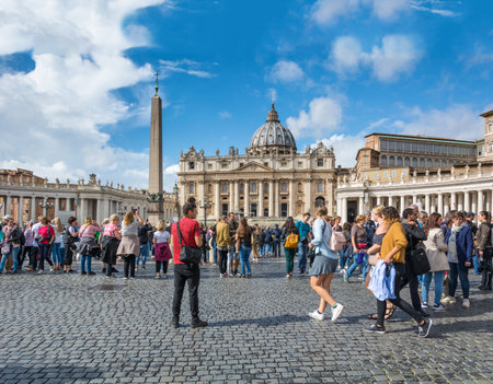 Vatican - Oct 06, 2018: Tourists bustle around St. Peter's Square in front of St. Peterâs Cathedralのeditorial素材