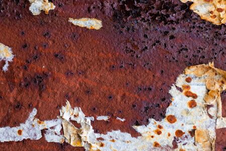 red rusted on the metal wall . background and Texture for your design.