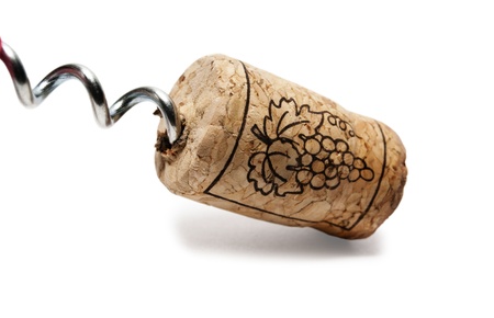Cork and corkscrew together on a white background.の写真素材
