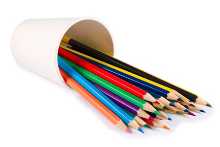 A stack of colored pencils on white backgroundの写真素材