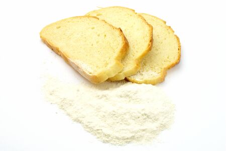 bread and flour on a white background isolatedの写真素材