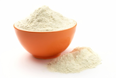 flour in a bowl on a white background isolatedの写真素材