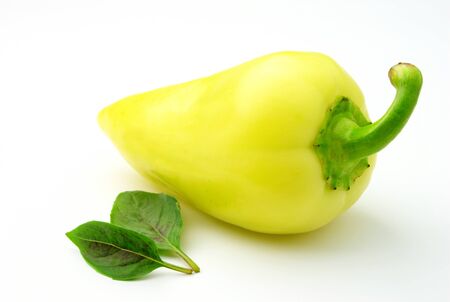 Bulgarian peppers and green basil on a white backgroundの写真素材