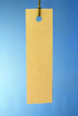yellow paper label on blue gradient background