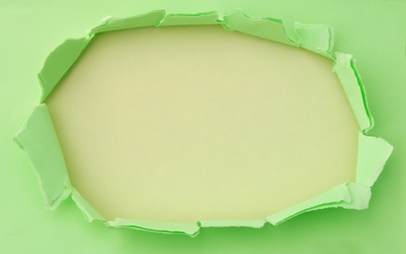 torn paper green and yellow colors for the backgroundの写真素材