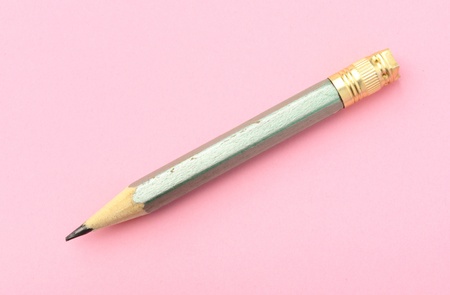 drawing short pencil on pink backgroundの写真素材