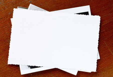 old paper on brown background composed of a stack ofの写真素材