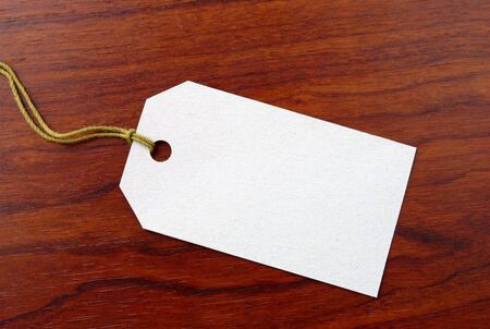 Label from a cardboard to a board of brown color