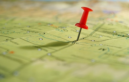 geographical map and marked the place on her tack geographical map and marked the place on her tack