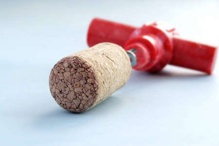 cork from wine and a corkscrew bulykiの写真素材