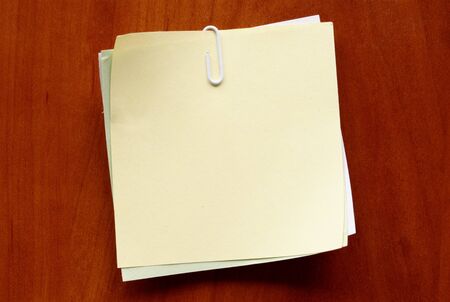 sheet of paper for notes and paper clip