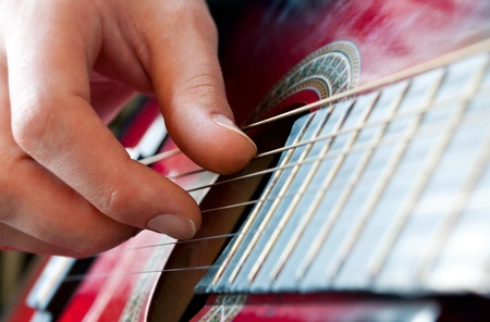 man playing a guitar