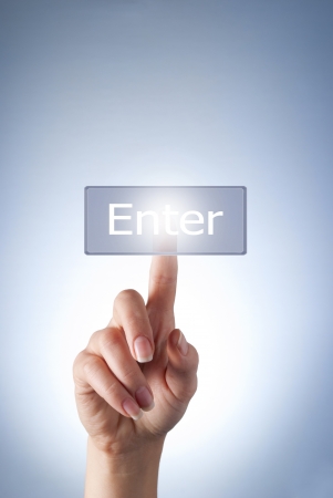 hand presses the virtual button girlの写真素材