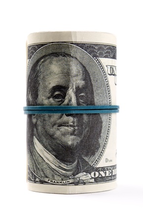American dollars rolled up on white backgroundの写真素材