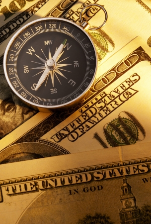 compass indicates the direction and the U S  dollarの写真素材