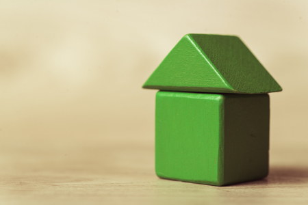 The green wooden house from children's blocksの写真素材