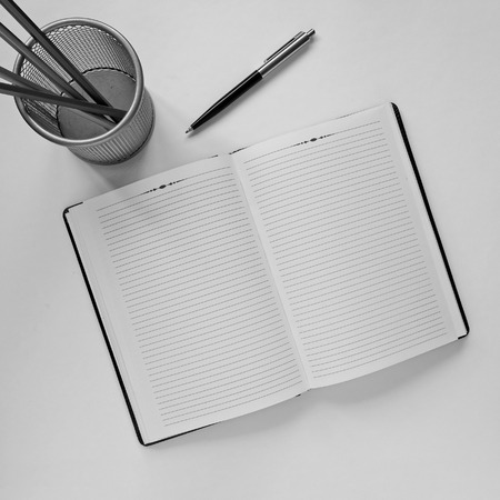 Top view of an office desk with stationery items