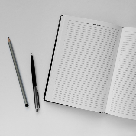 Top view of an office desk with stationery itemsの写真素材