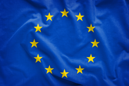 European Union EU flag blowing in the wind in full frame background conceptの写真素材