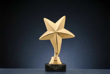 Gold star sporting trophy for a championshipの写真素材