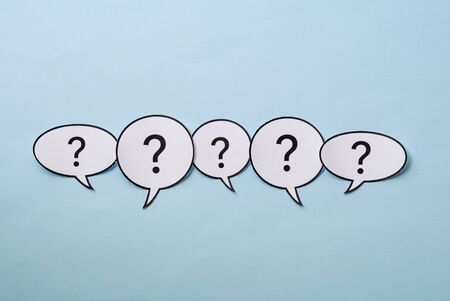 Line of question marks in speech bubbles
