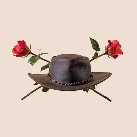 Cowboy hat and rose flowers wild west party concept classic  and american western.の写真素材
