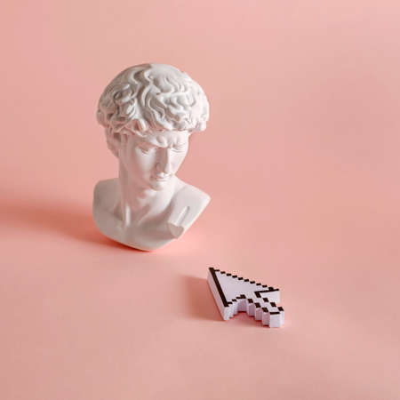 Michelangelo's david statue roman bust and mouse cursor display of computer and modern technology in...
