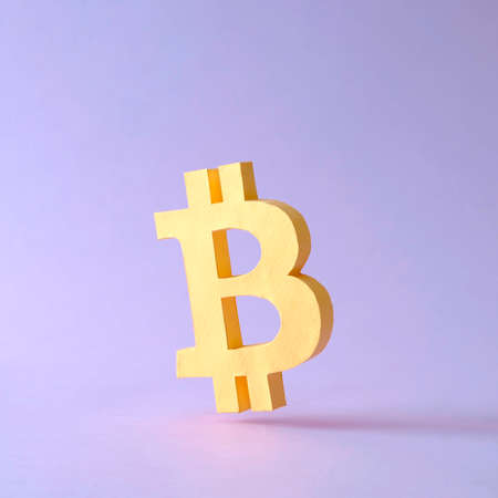 Bitcoin is the virtual cryptocurrency of the Internet and the modern economy and finance in the digital world. Minimal creative concept about success and money risk.の写真素材