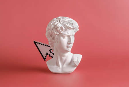 Roman or Greek bust statue of David and pixel mouse pointer cursor. Creative minimal futurism and art concept.の写真素材