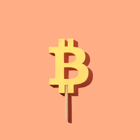 Bitcoin symbol with ice cream stick. Creative concept of mining crypto money and finance digital technology and economy.の写真素材