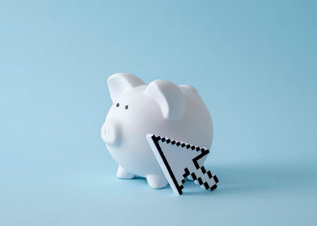 Piggy piggy bank on pastel blue background and pixel mouse cursor. Minimal trend creative concept of income and savings online or remote work from home.の写真素材