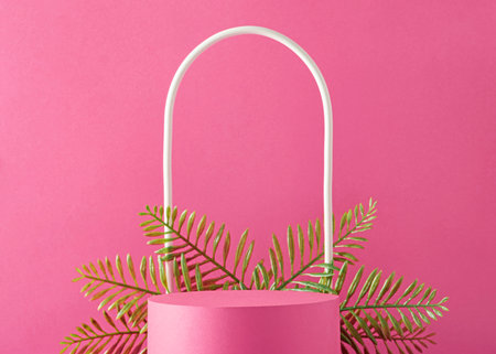 Magenta trend color background with a podium pedestal for showing the product and green eco plant. High quality photoの写真素材