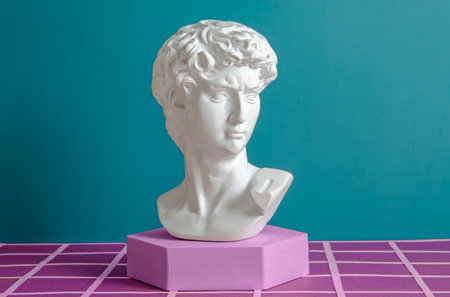 David antique statue on the podium in the digital space in the metaverse as a concept of digital art and business of the future. High quality photoの写真素材