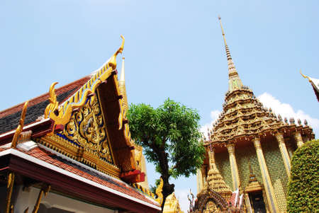 This photho was taken in Royal Palace, Bangkok on  09.02.2011. Wonder of Thai architecture, builded with precious metals shining in the sun. の写真素材