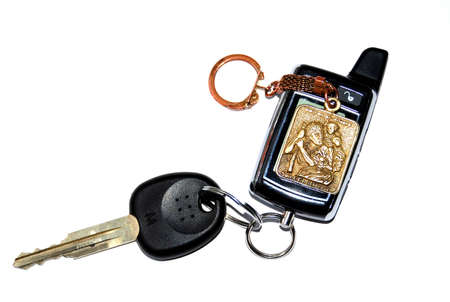 Photo was doon in Kiev on 12.2011.Keychain with a car key and the image of St. Christopher - patron saint of drivers, travelers, sailors and conductors.の写真素材