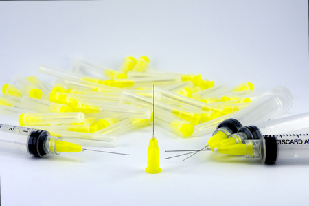 endodontic syringe for flushing the root canals of the tooth. Close-up of macro tools for dental treatmentの写真素材