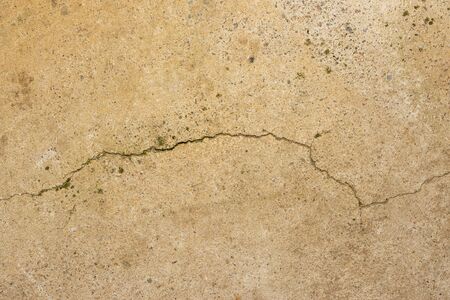 background texture old stucco wall with cracks. Close-up a macro