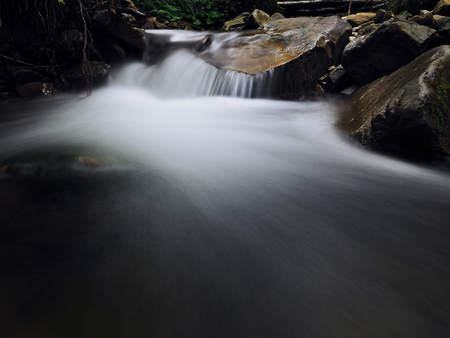 Waterfall at the carpatian mountains green forestの写真素材