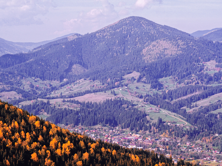 Carpatian village at mountains at the sunny day