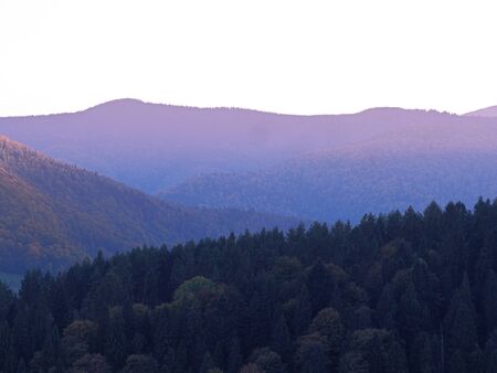 Carpatian village at mountains at the sunny dayの写真素材
