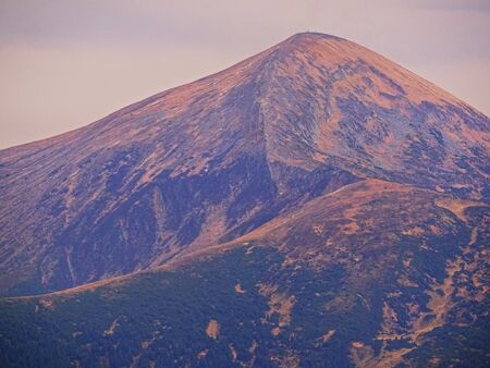 Carpatian village at mountains at the sunny dayの写真素材