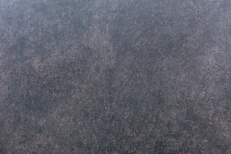 Spotted wall texture of gray-red granite with streaksの写真素材