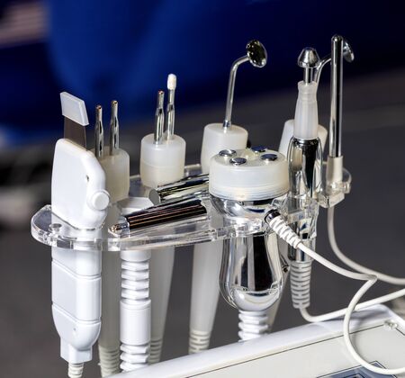 Close-up of various tools of medical cosmetology apparatus for liposuction and massage, used for the...