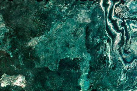 Marble streaks, similar to frozen lava flows, malachite emerald and marble texture.の写真素材